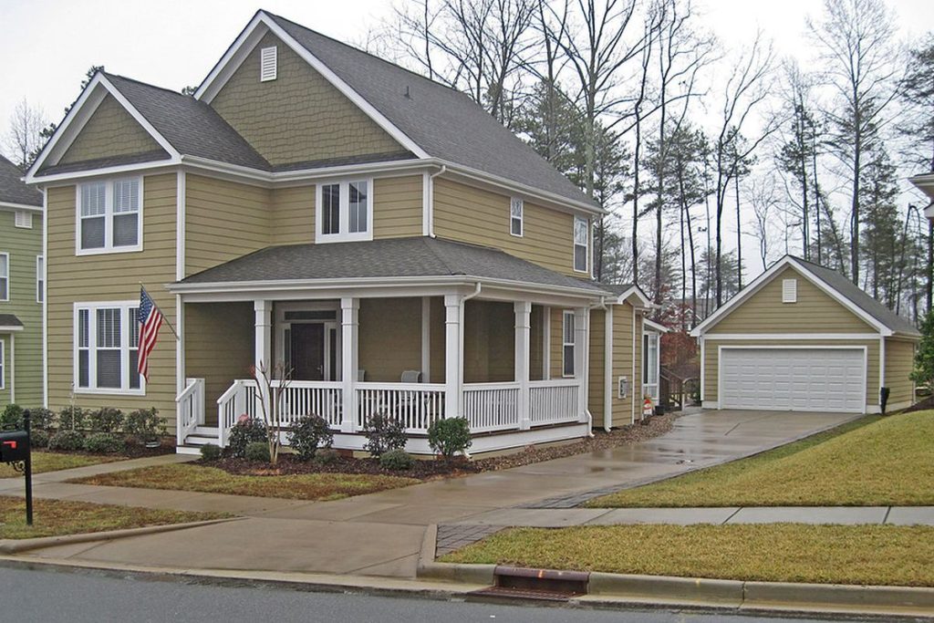 Front-load garage and concrete driveway for Kansas City polyjacking services