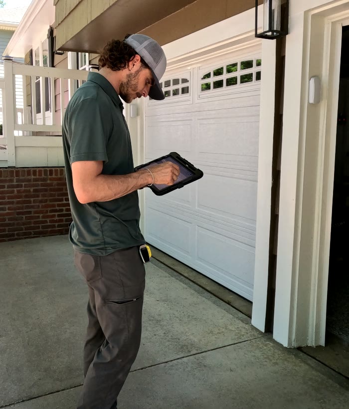 KC MudJack technician conducting a residential concrete inspection