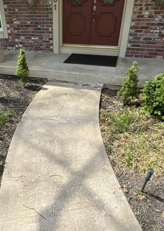 KC MudJack crew lifting a residential patio and walkway slab