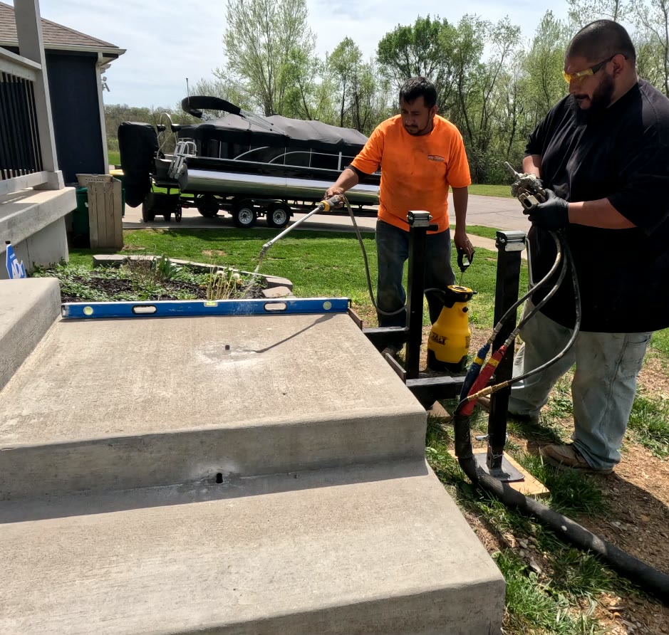 KC MudJack crew precisely lifting and stabilizing concrete